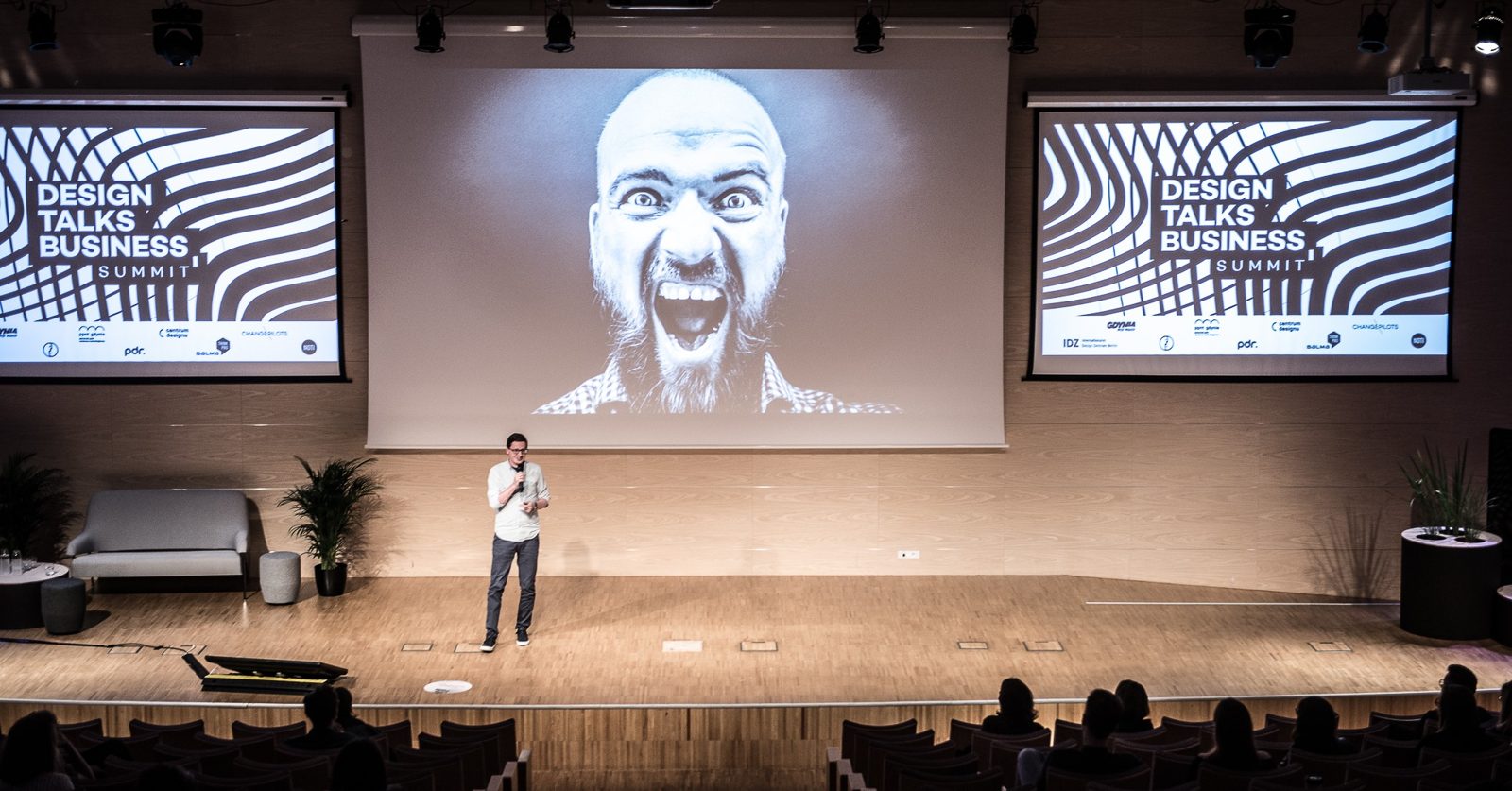 Błażej Wojtyła on stage at Design Talks Business Summit